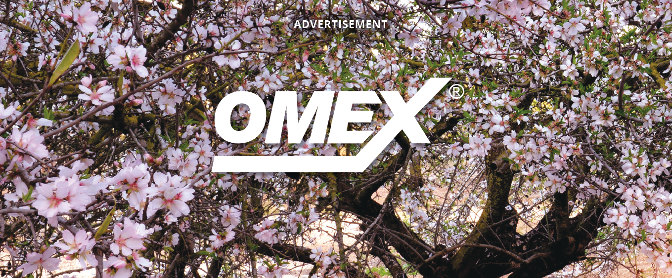 Image of almond blossoms with omex logo on top of it