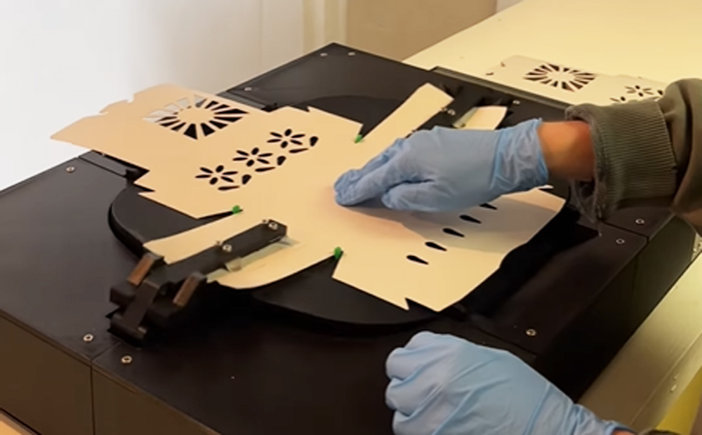 The FoldBot robot packaging system streamlines hand folding of cardboard.