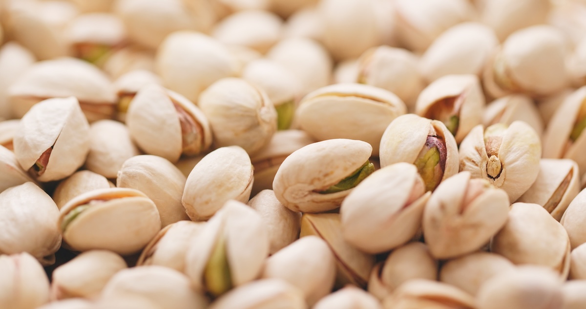 Close-up of pistachios in their shells.