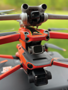 Three drones on top of each other.