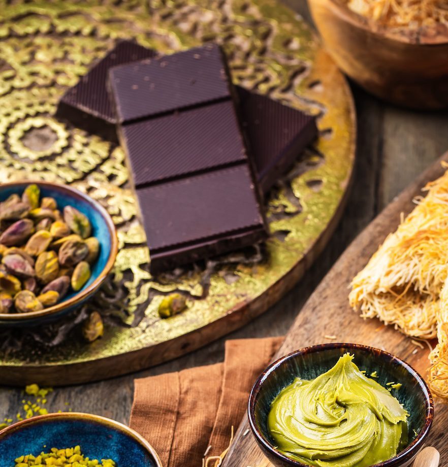 Preparing homemade chocolate with pistachio ingredients