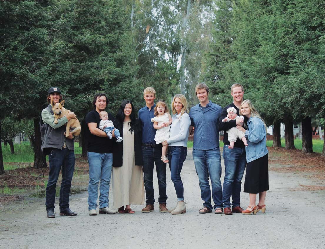group of men, women and children